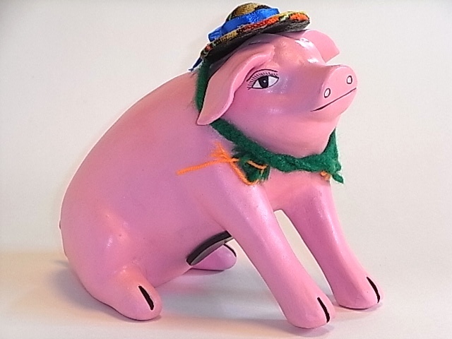 アンデスの帽子をかぶったピンクのブタの貯金箱