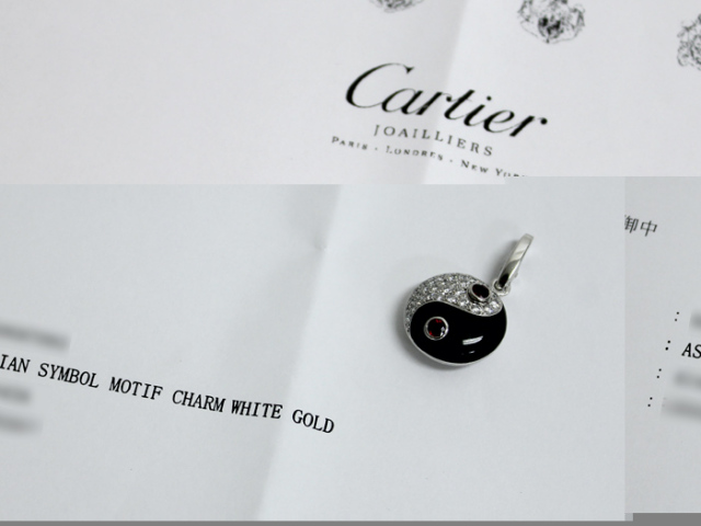カルティエ ◇ インヤン チャーム / ASIAN SYMBOL MOTIF CHARM