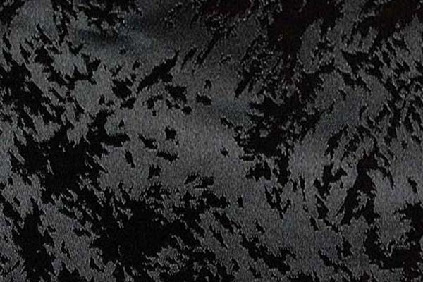 イベントや衣装に最適な光沢感のある素材　ポリエステルジャガード　炎の柄　黒 