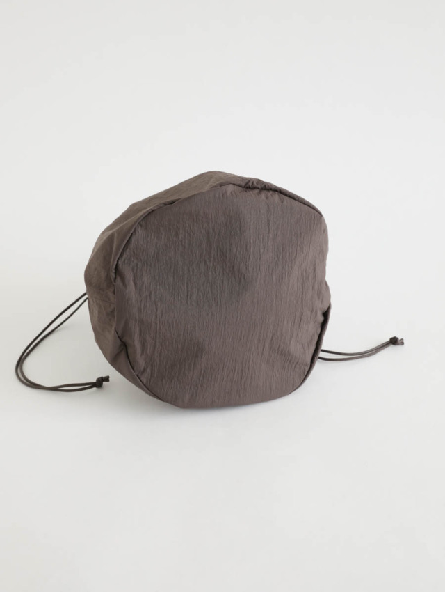 ERA SHRINK TAFFETA DUALPACK バックパック SHRINK TAFFETA HELMET BAG -umber- / Tranescent