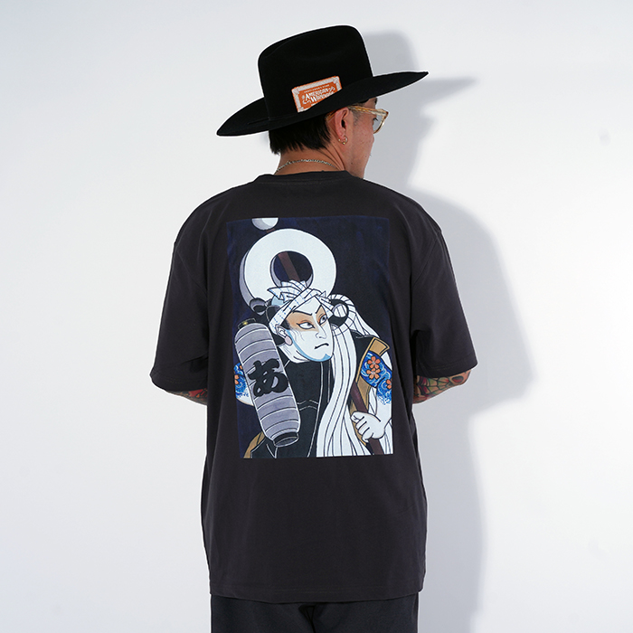 AMERICAN WANNABEアメリカンワナビー　Tシャツ　BLACK AWTO-250101 /「TRADE MARK S/S TEE / BLACK」プリントS/S Tシャツ