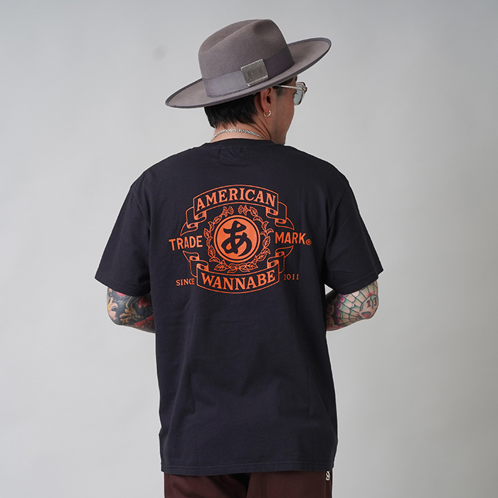 AWTB-250301 /「TRADE MARK S/S TEE / BLACK×ORANGE」プリントS