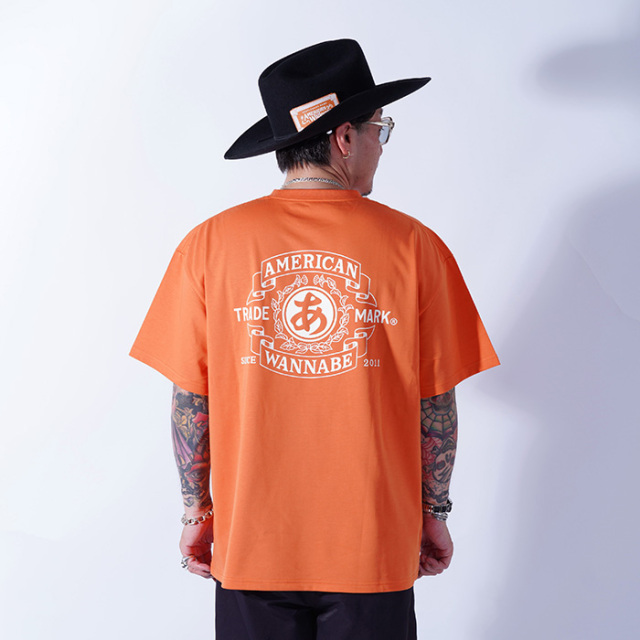 AWTO-250101 /「TRADE MARK S/S TEE / ORENGE」プリントS/S Tシャツ