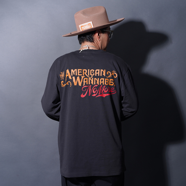 AMERICAN WANNABE/アメリカンワナビー「NO MORE Logo L/S TEE / BLACK」プリントL/S Tシャツ