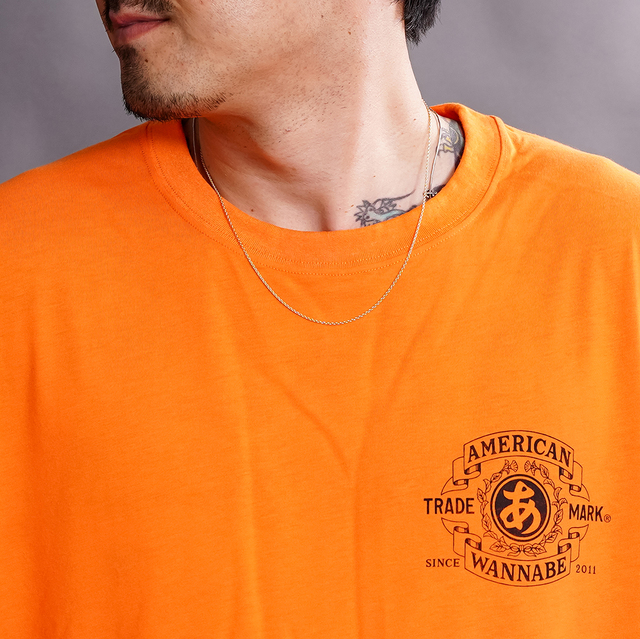 AWTO-260101 /「TRADE MARK S/S TEE / ORANGE」プリントS/S Tシャツ