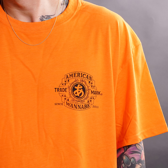 AWTO-260101 /「TRADE MARK S/S TEE / ORANGE」プリントS/S Tシャツ