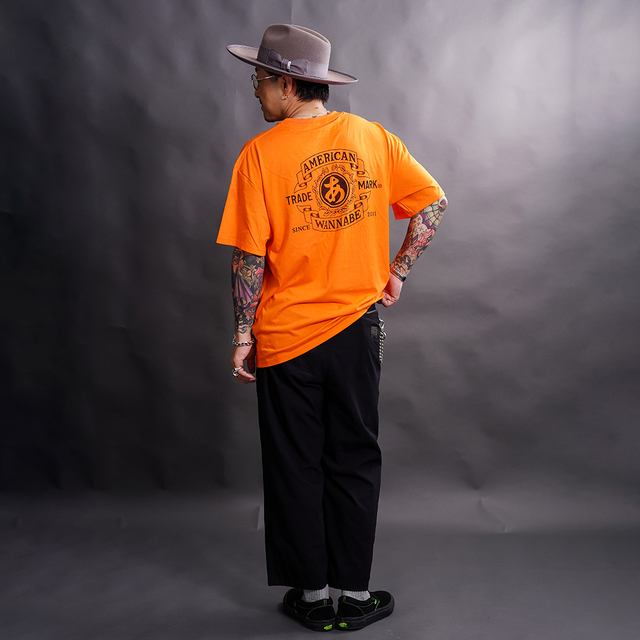 AWTO-260101 /「TRADE MARK S/S TEE / ORANGE」プリントS/S Tシャツ