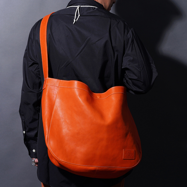 AWA-250602 /「LEATHER NEWS PAPER BAG / ORANGE」レザーニュース