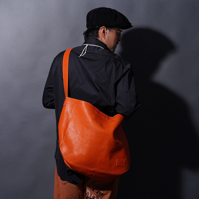 AWA-250602 /「LEATHER NEWS PAPER BAG / ORANGE」レザーニュース