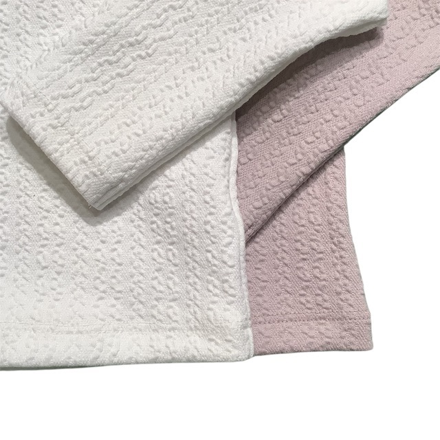 縄編み柄カーディガン