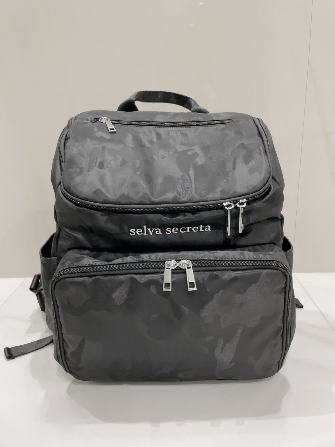 【selva secreta】bucket RUCKSACK(camouflage-black×silver)