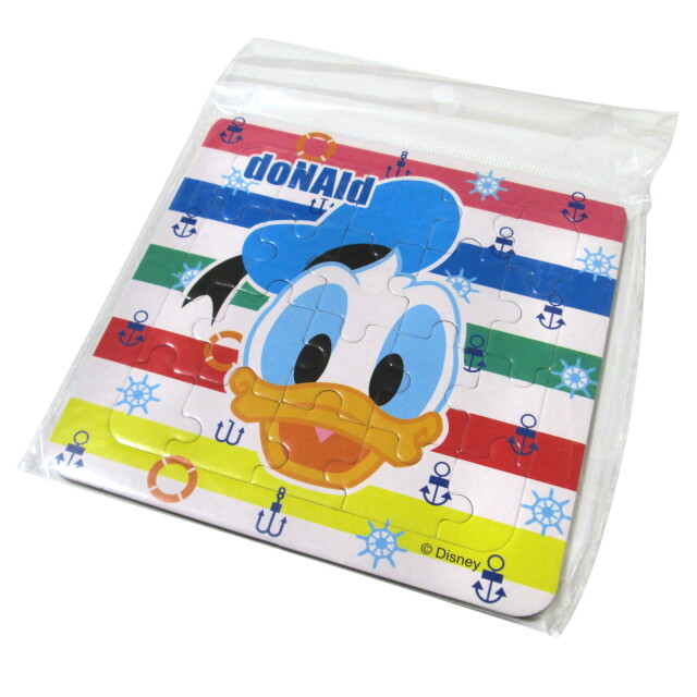 駄菓子 通販】ディズニーオールスター顔柄20Pパズル 駄菓子・イベント