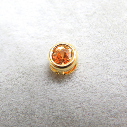 ゴールドフィルド・チャーム/天然石オレンジサファイア（加熱処理・アフリカ）（ラウンド3mm）ベゼル「14kgf」（1個）