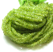 ペリドット 天然石ビーズ ラウンデル・ボタンカット 3～4mm 約32センチ 1連