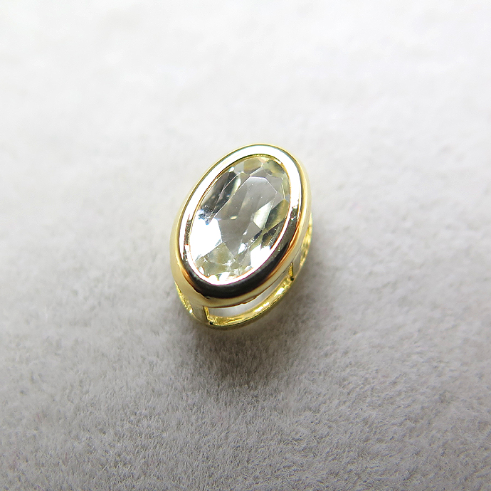 ゴールドフィルド・チャーム/天然石ホワイトトパーズ（オーバル6×4mm）ベゼル「14kgf」（10個）
