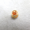 ゴールドフィルド・チャーム/天然石オレンジサファイア（加熱処理・アフリカ）（ラウンド3mm）ベゼル「14kgf」（1個）
