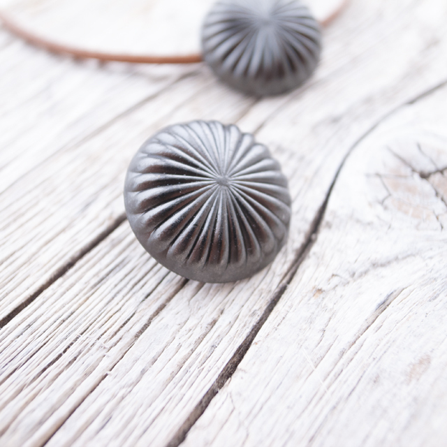 コンチョボタン