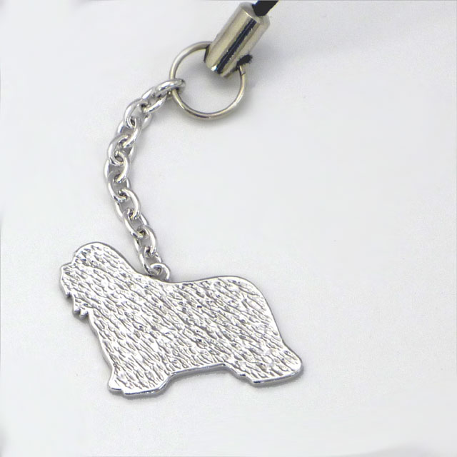 ビアデッドコリーのシルエットをかたどった、シルバー９２５製の携帯ストラップです。