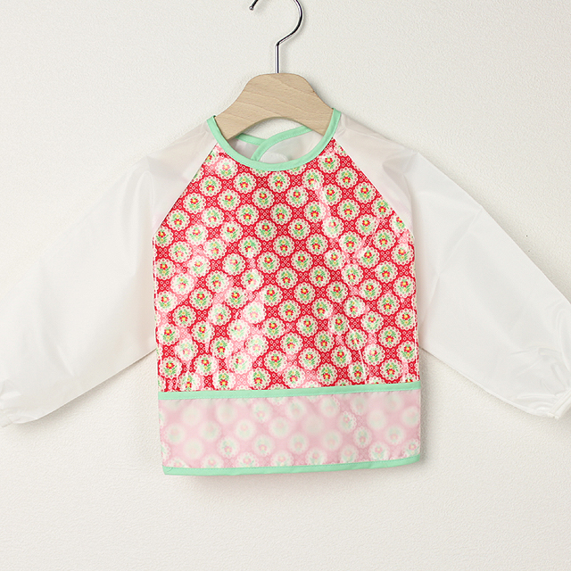 【セール70%OFF】ninita （ニニータ） フラワー柄長袖エプロン 赤  【おまかせ配送で送料お得】