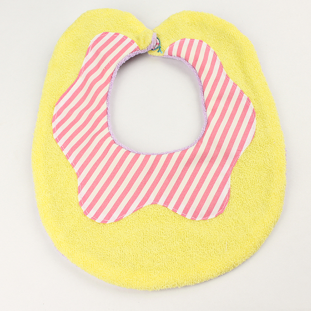 【セール70%OFF】Couverture(クウベルチュール） doughnut　ビブ バナナ 黄色Xピンクストライプ【おまかせ配送で送料お得】