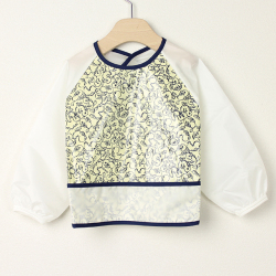 【セール70%OFF】ninita （ニニータ） アヒル柄長袖エプロン イエロー  【おまかせ配送で送料お得】