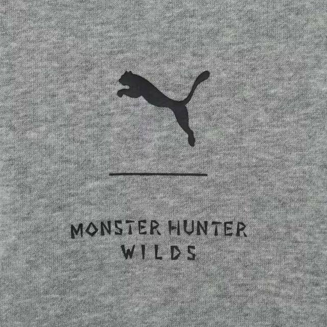 PUMAプーマMONSTERHUNTERSWEATHOODIEモンスターハンターワイルズフーディフロントプリント637017-03