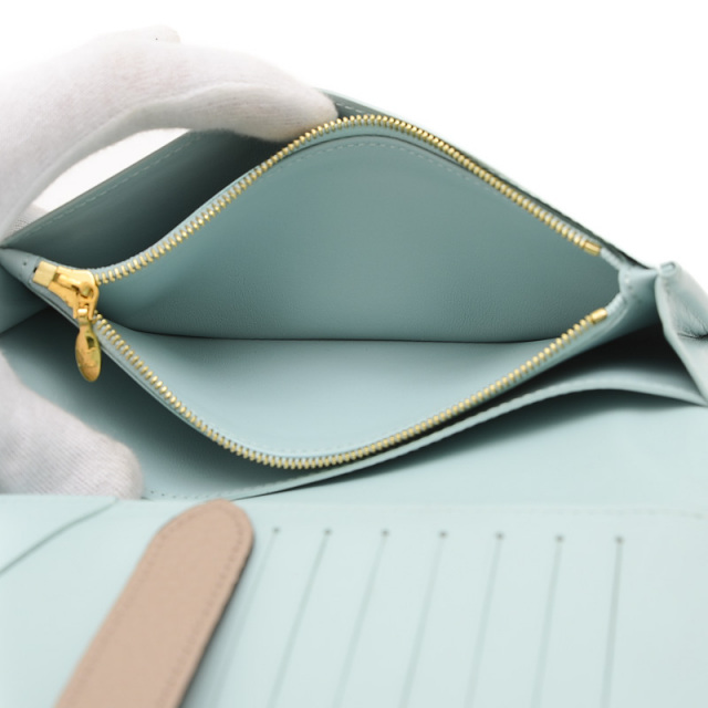 ルイヴィトン LV ヴェルティカル ウォレット 二つ折り長財布 トリヨン  