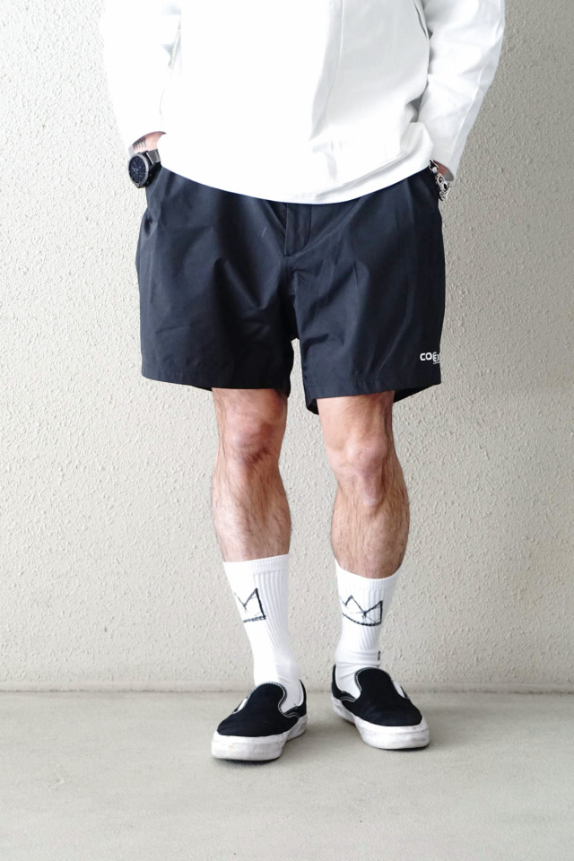 COMFY OUTDOOR GARMENT "COMP SHORTS COEXIST" BLACK