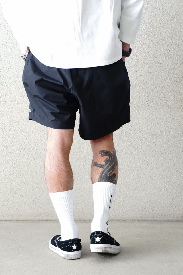 COMFY OUTDOOR GARMENT "COMP SHORTS COEXIST" BLACK