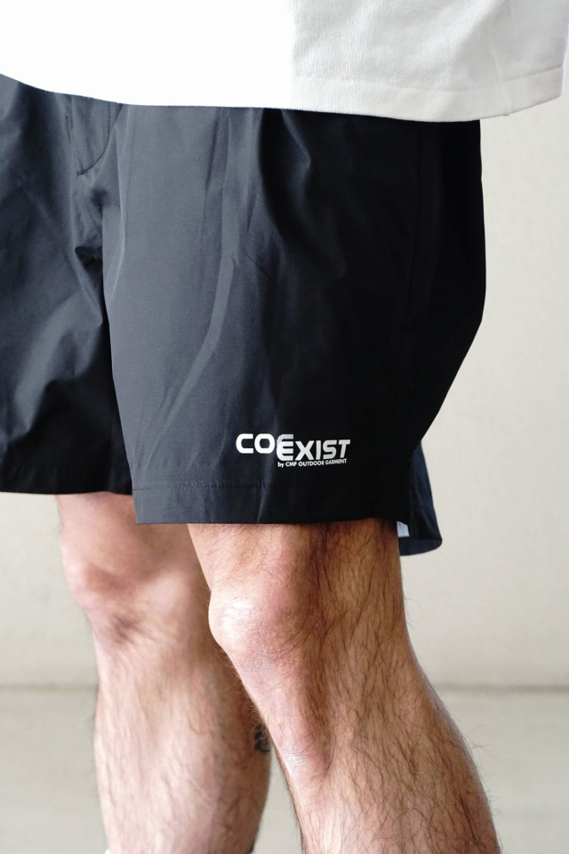COMFY OUTDOOR GARMENT "COMP SHORTS COEXIST" BLACK