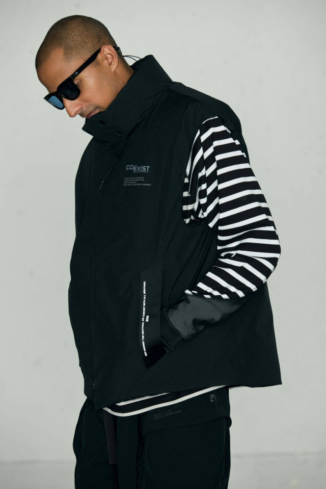 CMF OUTDOOR GARMENT "NOMAD DOWN VEST COEXIST"