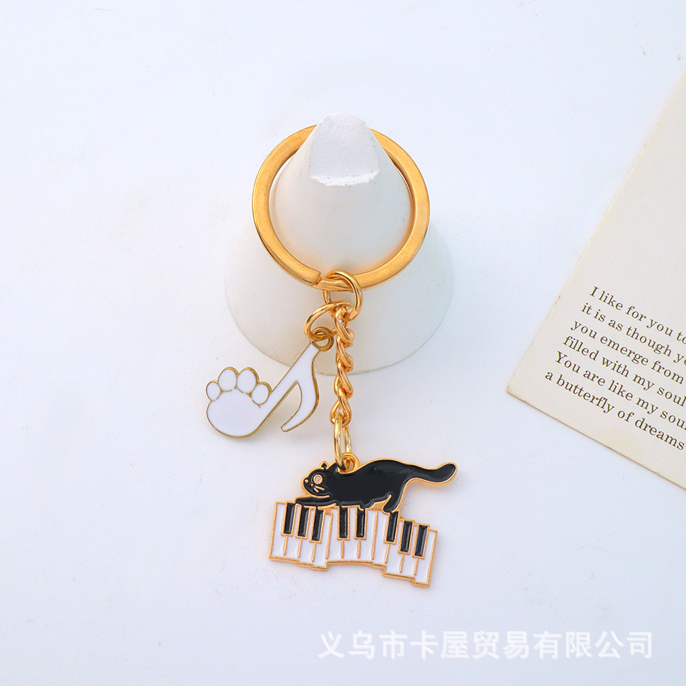 キーホルダー キャットミュージック  cantabile ピアノ教室発表会記念品 音楽雑貨 吉澤 セトクラフト お取り寄せ商品 引き出物 記念品 音楽雑貨 音符 ピアノモチーフ ト音記号 ピアノ雑貨