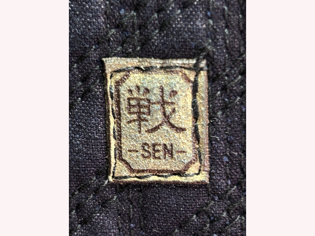 ブラック達磨「戦」