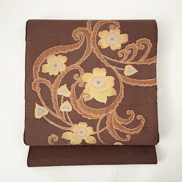 『染名古屋帯』　茶地　金彩更紗柄