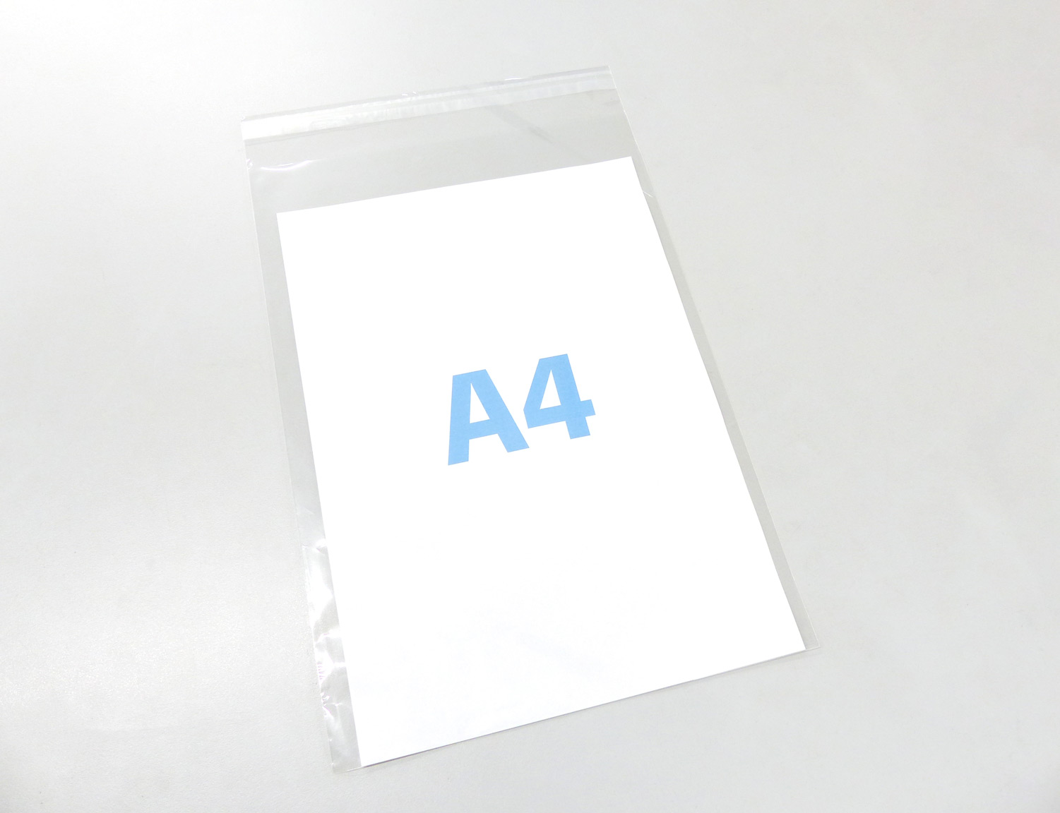 A4 特大サイズUVカット透明PP袋（透明封筒）【235x340+40mm】厚さ40ミクロン　テープ付き