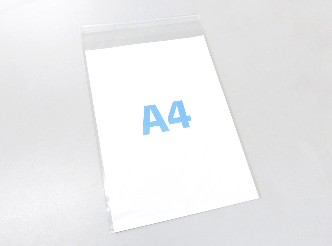A4 小サイズUVカット透明PP袋（透明封筒）【220x315+35mm】厚さ40ミクロン　テープ付き