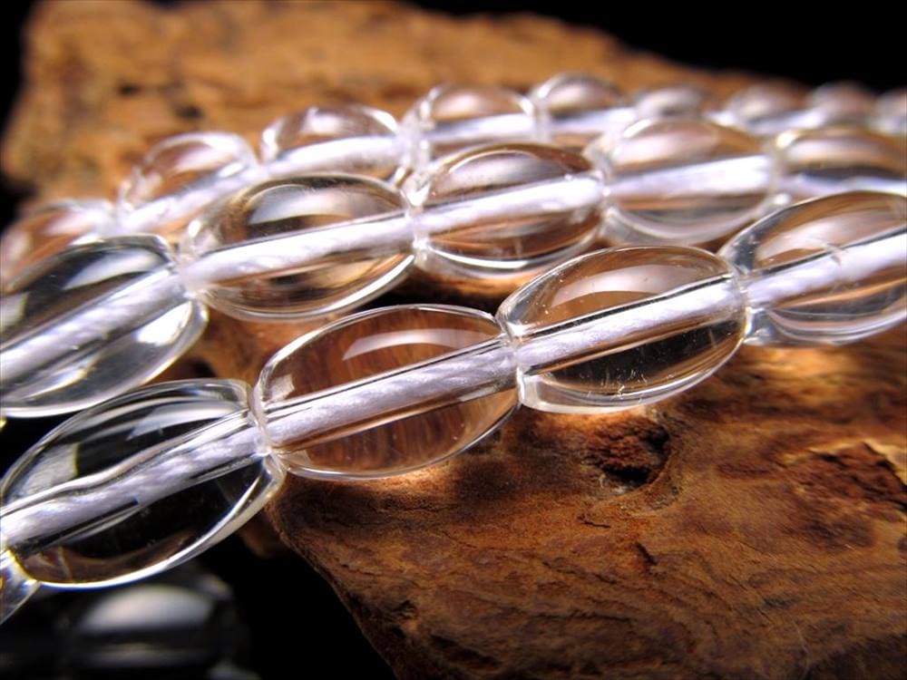 天然水晶 天珠型 連 縦約9.5mm-10mm×幅約6.5mm-7mm 長さ約38-40cm 純粋と浄化を象徴する万能ストーン クリスタル ブラジル産