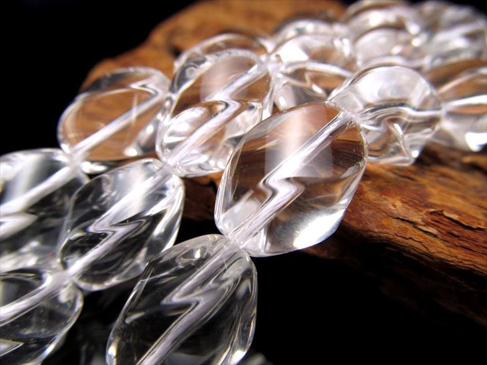 天然水晶 ツイストタンブル型 連 縦約12.5mm-15mm×幅約8.5mm-10.5mm 長さ約38-40cm 純粋と浄化を象徴する万能ストーン クリスタル ブラジル産