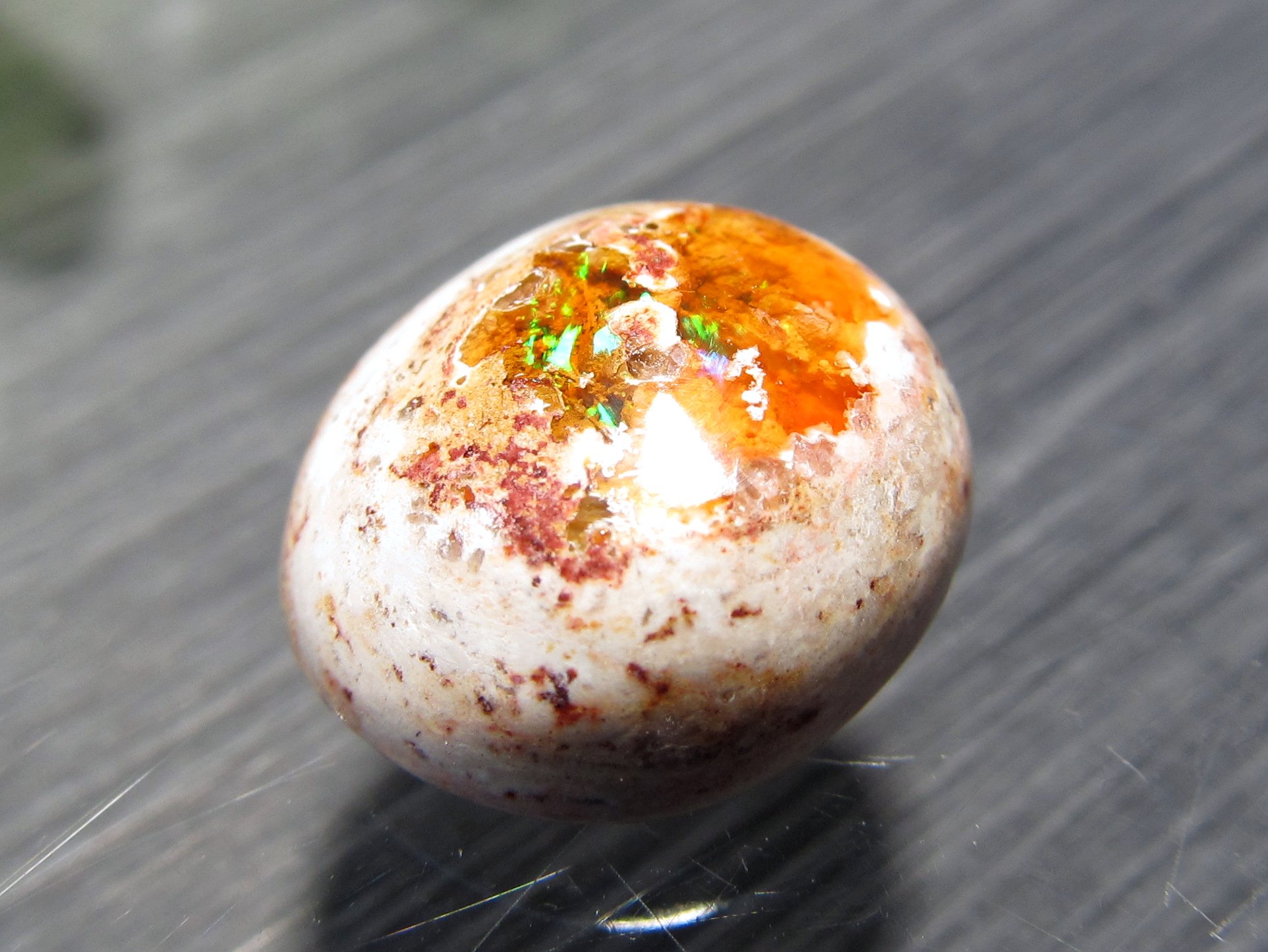 ふたつとして同じ物が無い出会いの宝石 カンテラオパール(蛋白石)カボションタンブル 最大幅約14mm 重さ1.3g ハミングバードの宝石