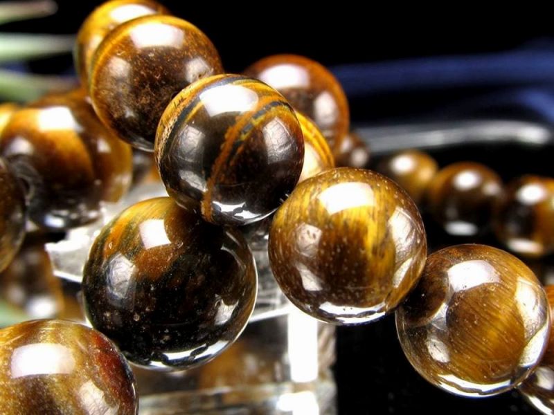 イエロータイガーアイ ブレスレット 約8mm-9mm×23珠前後 定番のイエローカラー 艶やかな縞模様 力と財力の象徴 お金がたまる石 南アフリカ産