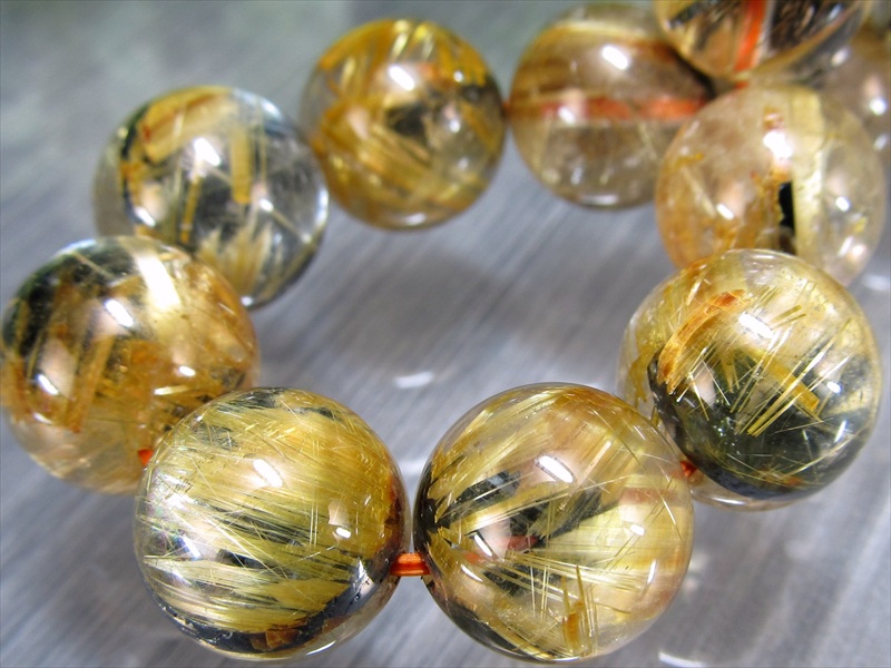 迫力の大珠力強い雷神ルチル 3A+ 雷神ゴールドタイチンルチルクォーツ ブレスレット 12mm-12.5mm×17珠 ギラギラゴールド 金運の代表石 母岩ヘマタイト入り