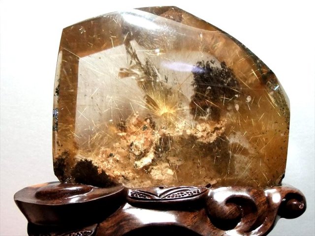 1311g おもちゃ 金運ルチルクォーツ原石(台座付)