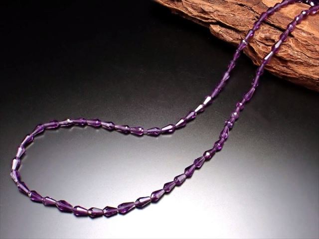 縦約4.5mm-6mm×横約3mm アメジスト ドロップカット 一連 約34-36cm 紫