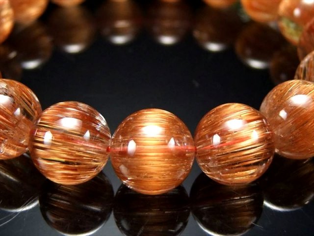 至高の輝き ロイヤルクラス オレンジキャッツアイルチルクォーツ 