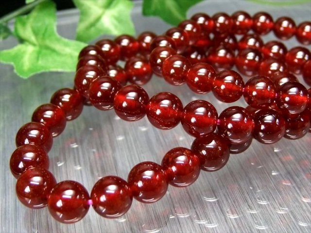 オレンジガーネット ヘソナイトガーネット ブレスレット 7mm-7.5mm×25