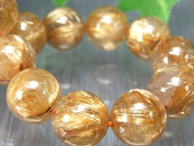 店頭展示中 束針タイチン 4A+ ゴールドタイチンルチルクォーツ ブレスレット 12mm-12.5mm×17珠 金運の代表石 明るめ煌めきキラキラ針 一点もの ブラジル産