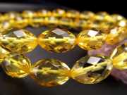 ハニーアンバー ブレスレット 天珠カット型 幅約6.5mm 蜂蜜のようなハニーイエローカラー 東欧の宝石 バルト海産