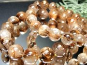 3A タイガータイチンルチルクォーツ ブレスレット 12.5mm-13mm×17珠前後 落ち着いたブラウンゴールドカラー 束針多め くっきりルチル ブラジル産