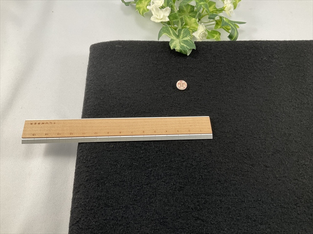 圧縮ブークレーウールニットブラック