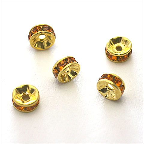 スワロフスキー平ロンデル　トパーズ/ゴールド　5mm